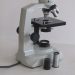 what does the base do on a microscope