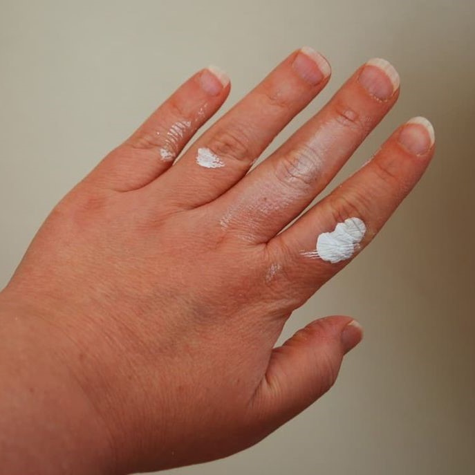how to get oil based paint off skin