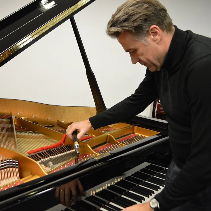 how much does it cost to tune a piano