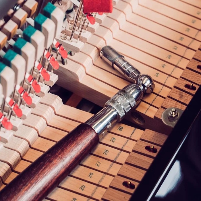 how much does it cost to tune a piano