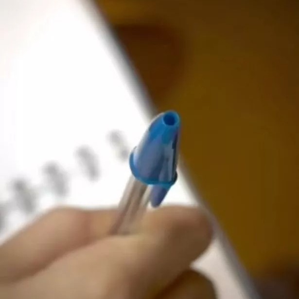 why do pen caps have holes